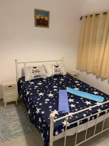 מיטה או מיטות בחדר ב-PREMIUM COMFORT PRIVATE