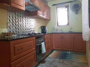 Кухня или мини-кухня в La Villa Marie Joana
