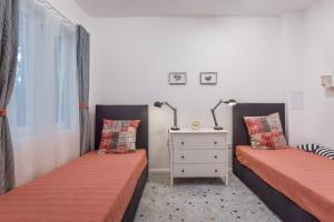 A bed or beds in a room at Cosy & renovated 2BD flat near Vitoshka by Flat Mаnager