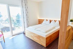 I AM HOTEL Graz-Seiersberg客房内的一张或多张床位