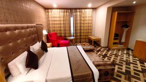 Postel nebo postele na pokoji v ubytování Best Western Ashoka