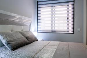 Posteľ alebo postele v izbe v ubytovaní NEW 2020 Residencial Aqua Beach -Apartment Torrevieja Center