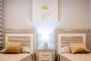 Posteľ alebo postele v izbe v ubytovaní NEW 2020 Residencial Aqua Beach -Apartment Torrevieja Center