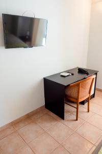 TV i/ili multimedijalni sistem u objektu Apartment-rooms Preka