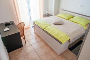 Postel nebo postele na pokoji v ubytování Apartment-rooms Preka