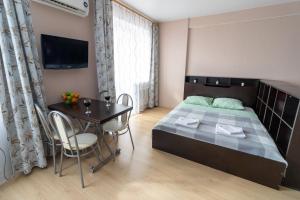 Llit o llits en una habitació de Apartments StarHouse на Современнике