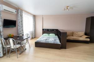 Llit o llits en una habitació de Apartments StarHouse на Современнике