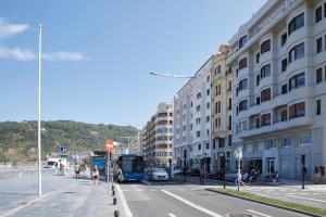 a city street with a bus on the street at Jai Alai 54 by FeelFree Rentals in Donostia-San Sebastián