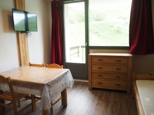 Et tv og/eller underholdning på travelski home select - Résidence Médian by Travelski