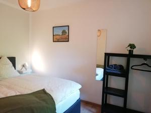 Postel nebo postele na pokoji v ubytování Ferienhaus Fasanennest