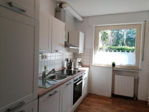 Kuchyň nebo kuchyňský kout v ubytování Ferienhaus Fasanennest