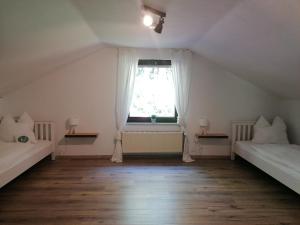 Postel nebo postele na pokoji v ubytování Ferienhaus Fasanennest