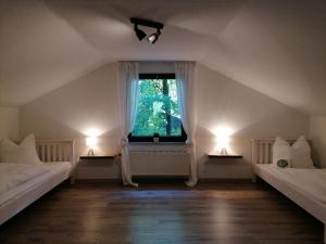Postel nebo postele na pokoji v ubytování Ferienhaus Fasanennest