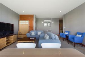 Posezení v ubytování Golf View Suite Private Apartment Khao Yai