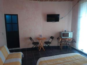 Foto dalla galleria di Hospedaje Casa Cortés - Recamaras de Descanso en Tepoztlán Mor a Tepoztlán Altre 18 foto