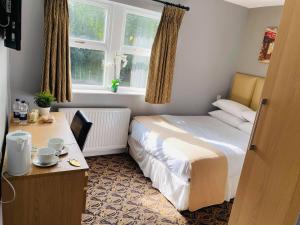 A bed or beds in a room at The Liversedge