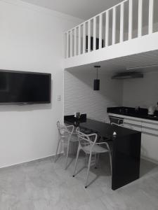 Télévision ou salle de divertissement dans l'établissement Apartamento Guarujá - Pitangueiras