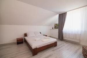 Ένα ή περισσότερα κρεβάτια σε δωμάτιο στο Margit Sziget
