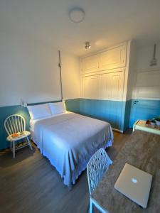 Postel nebo postele na pokoji v ubytování Angatu Hostel