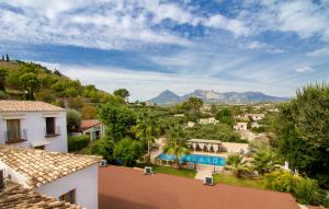 an aerial view of a villa with a swimming pool at Hotel Tossal d'Altea in Altea
