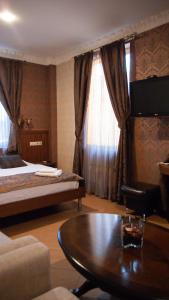 
Кровать или кровати в номере Гостиница Бродвей Москва
