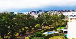 Vista de la piscina de Alameda Cariari Apartments o alrededores