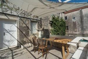 Patio nebo venkovní prostory v ubytování 4 Limuna - Stone House