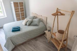 A bed or beds in a room at Casa Ghisa