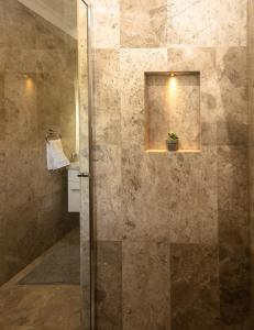 a shower with a glass door in a bathroom at Bella Vista Stanthorpe in Stanthorpe