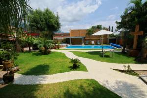 Bazén v ubytování Hotel Concierge Flor y Canto nebo v jeho okolí