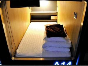 Postel nebo postele na pokoji v ubytování MyBed Ratchada