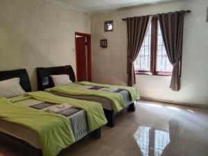 Postel nebo postele na pokoji v ubytování Blessing Hills Family Resort & Hotel + 57 fotografií