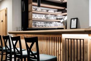Lounge nebo bar v ubytování Oliva Hotel