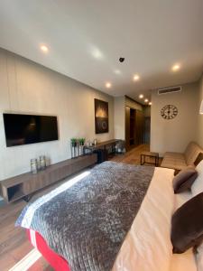 Postel nebo postele na pokoji v ubytování Aparts Hotel Radom + 37 fotografií