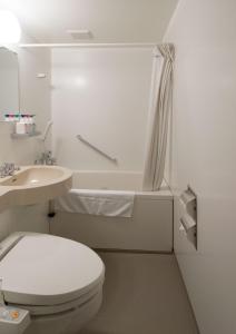 Baðherbergi á Uozu Manten Hotel Ekimae