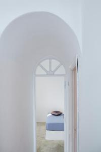 A bed or beds in a room at Altana Heritage Suites