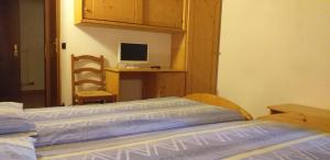 Postel nebo postele na pokoji v ubytování Hotel Villa Fosine