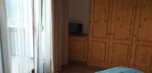 TV a/nebo společenská místnost v ubytování Hotel Villa Fosine