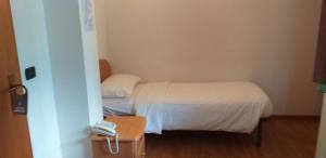 Postel nebo postele na pokoji v ubytování Hotel Villa Fosine