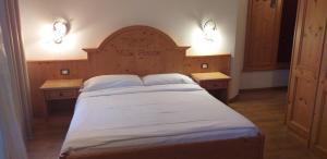 Postel nebo postele na pokoji v ubytování Hotel Villa Fosine
