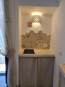 A kitchen or kitchenette at Dimora del ciliegino