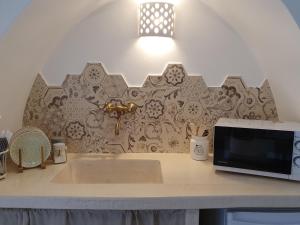 A kitchen or kitchenette at Dimora del ciliegino