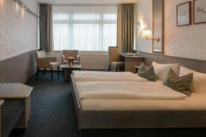 Posezení v ubytování Hotel am Wasserfall + 24 fotografií