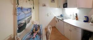 Una cocina o cocineta en Ferienwohnung Diekelmann _ Poststr