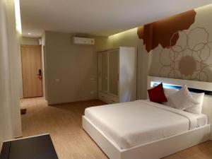 Postel nebo postele na pokoji v ubytování Platinum hotel