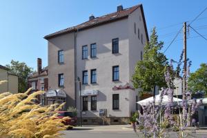 a building on the corner of a street at Weisser Brunnen in Gotha