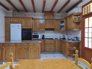 Kuchyňa alebo kuchynka v ubytovaní Casa MarTa