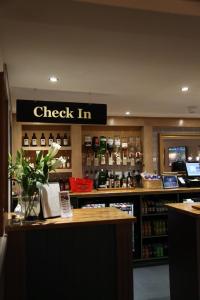 a check in counter in a liquor store at Alcester Inn in Alcester