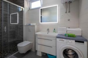 Kúpeľňa v ubytovaní Apartment Fragola + 28 fotografií