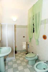 a bathroom with a toilet and a sink at B&B Vista Gallipoli in Alezio +28 photos